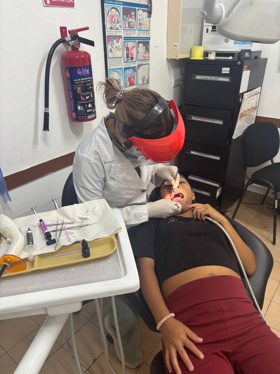 Dr. Karla Estudillo performing crown-based full-mouth rehabilitation in Cancun